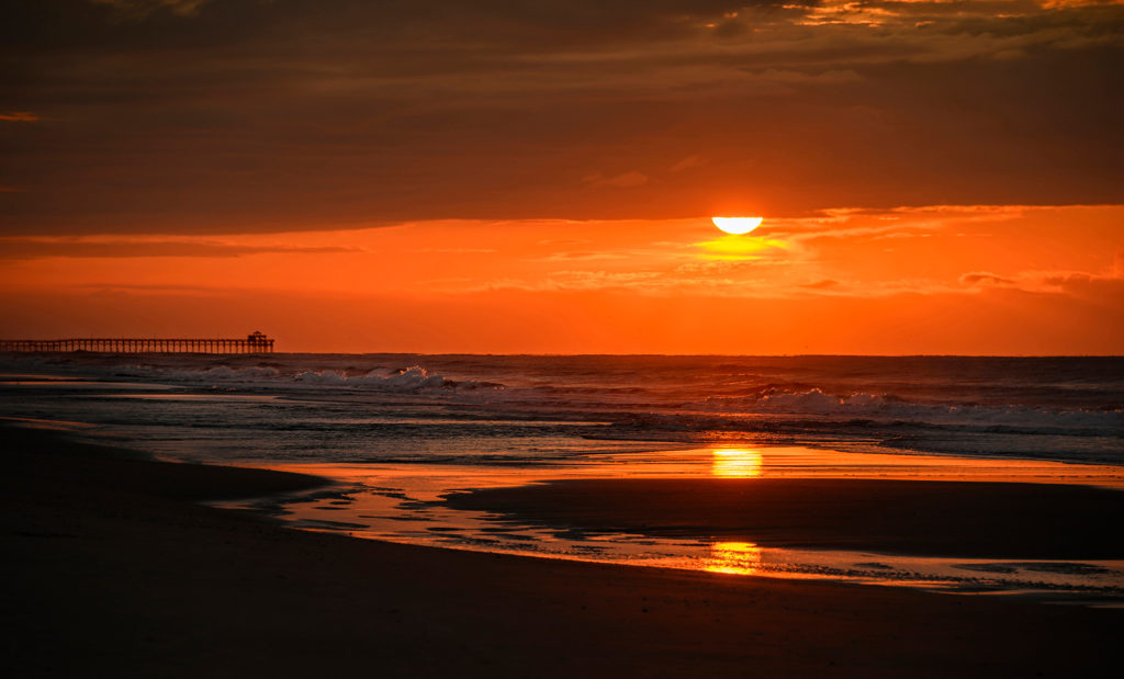 sunrise on the beach over The Atlantic Ocean on Myrtle Beach South Carolina