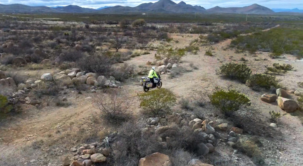 rugged off road trail riding in the desert on BMW adv motorcycle